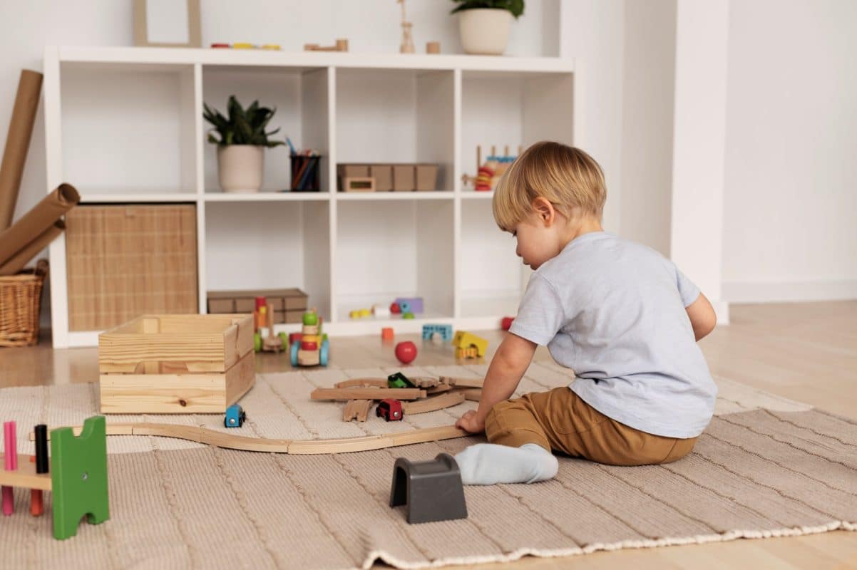 Montessori developmental play for toddlers and preschoolers on low wooden shelves