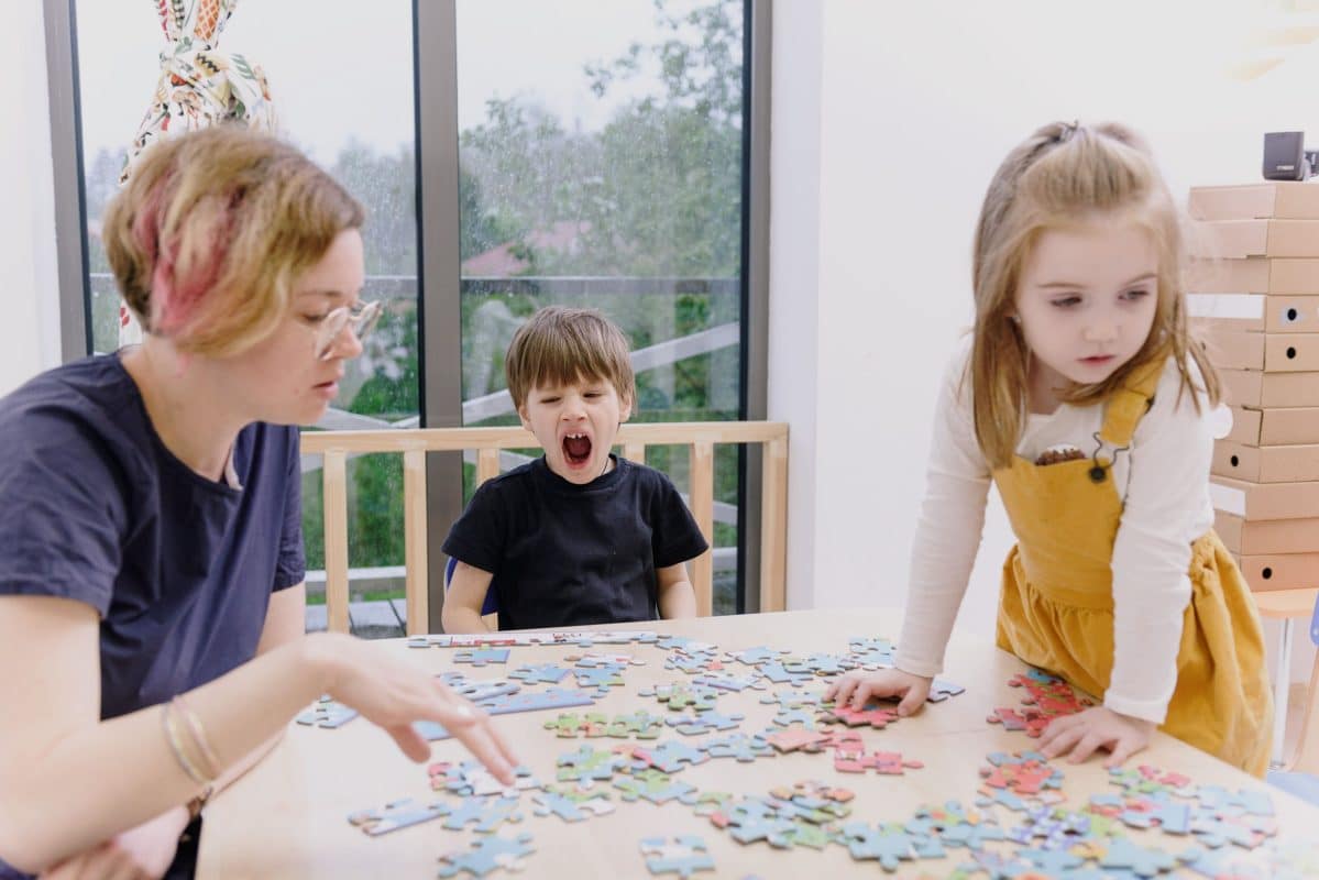 Child working through a logic puzzle while developing problem-solving and thinking skills